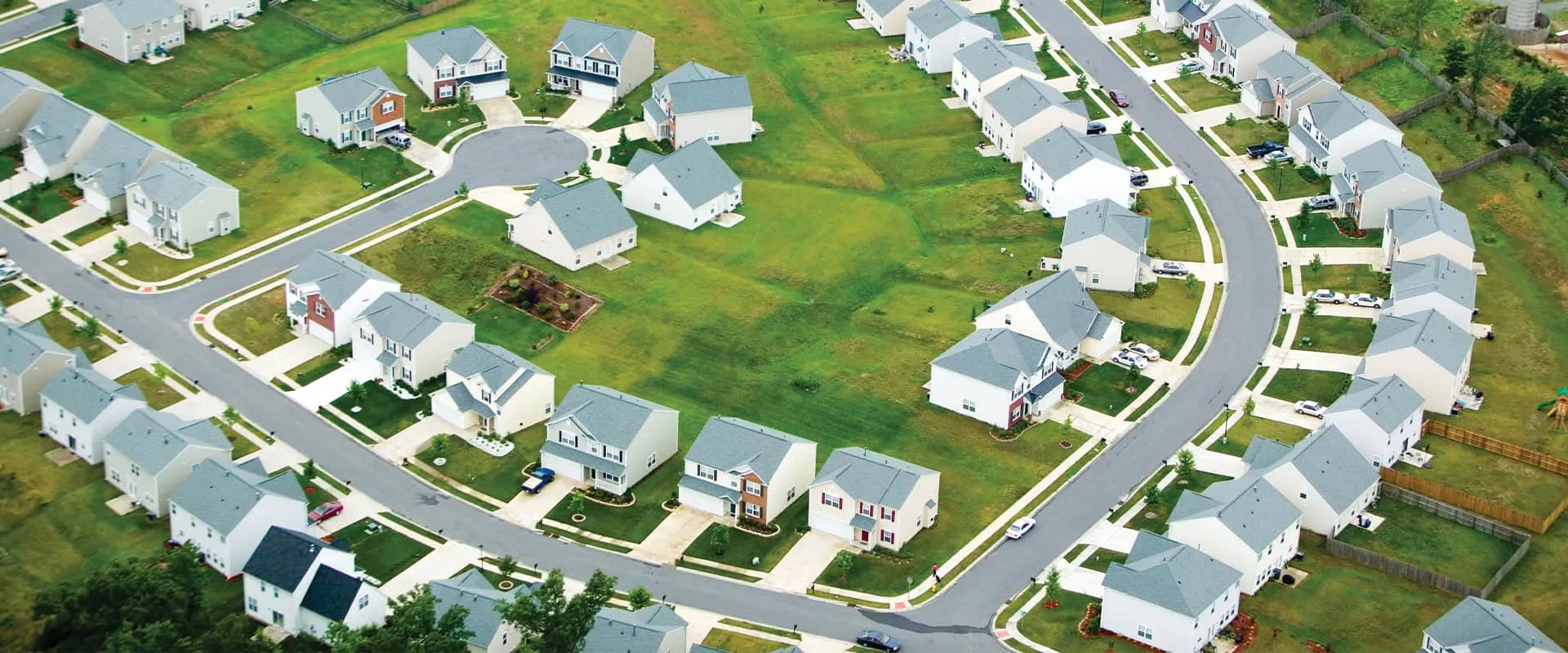 Aerial view of a Charlotte-area neighborhood with rows of single-family homes